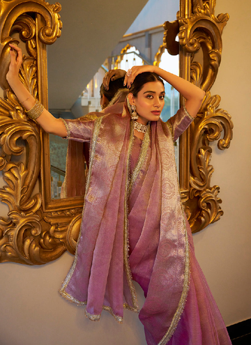 Party wear Light pink Tissue shimmer saree with zari weaving and sequin lace